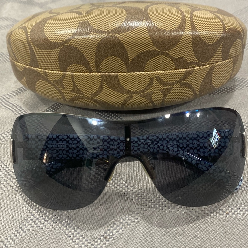 Coach women’s sunglasses like new navy blue with silver accents also have brown